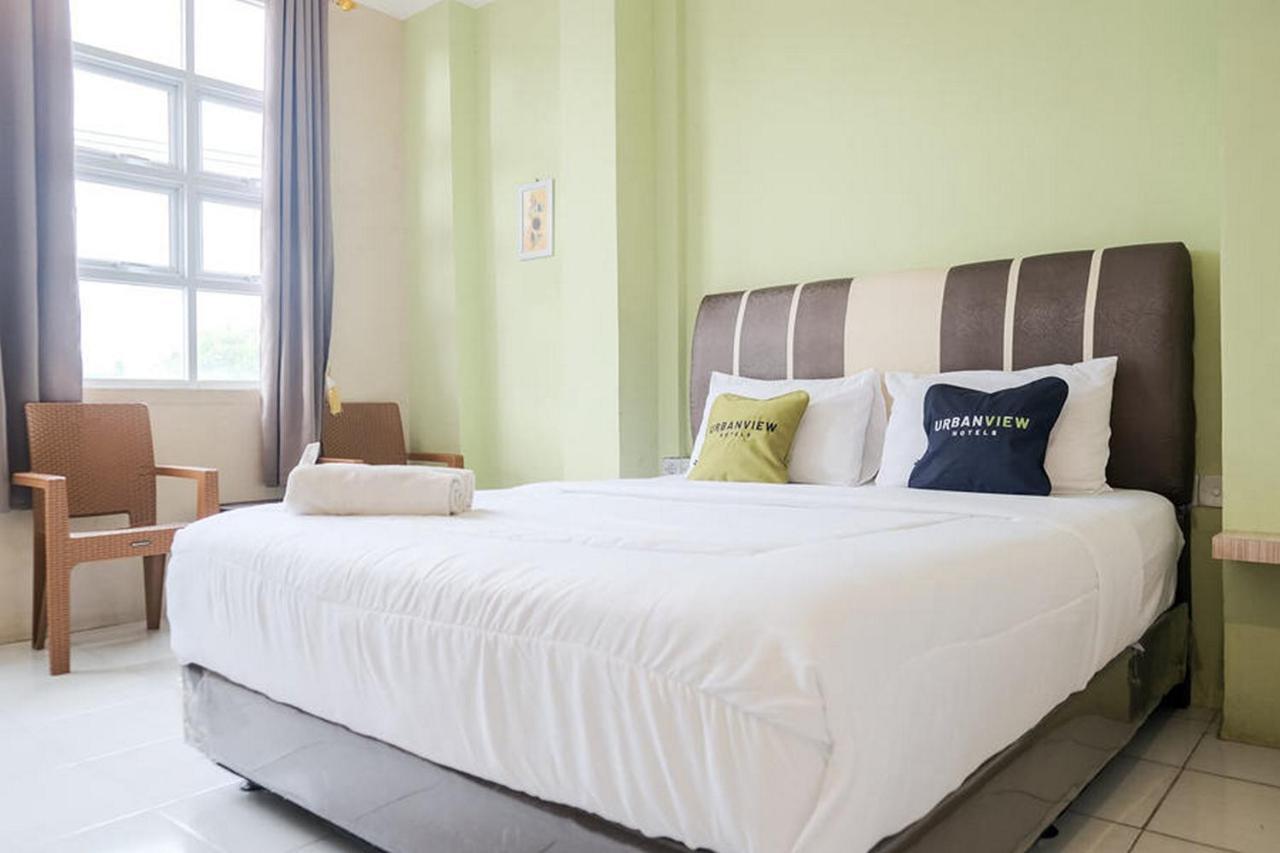 Urbanview Hotel Ta Ke Jelutung Puncak Jambi Exterior photo