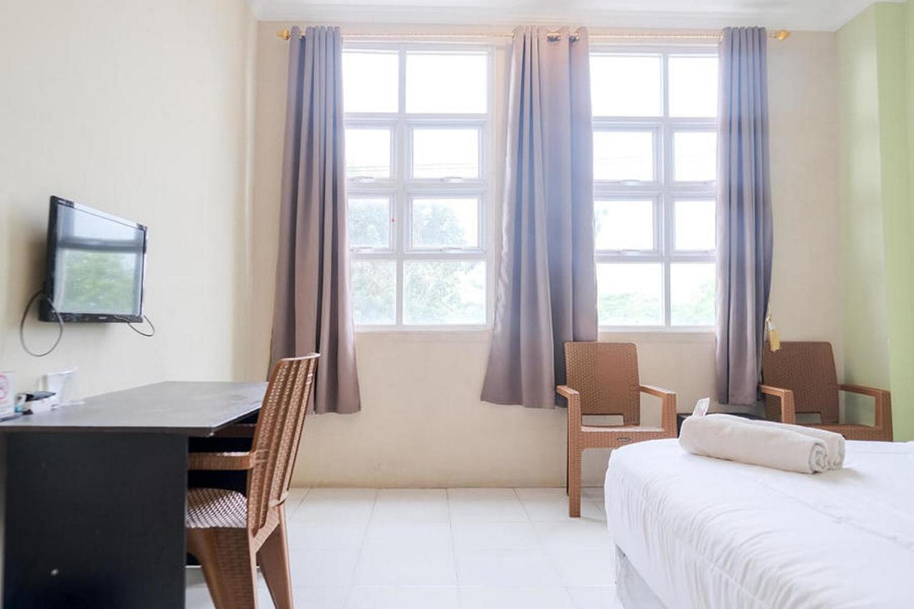Urbanview Hotel Ta Ke Jelutung Puncak Jambi Exterior photo